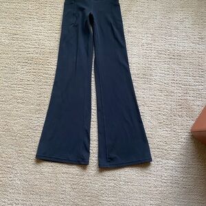 Athleta Salutation Stash Black Flared Leggings